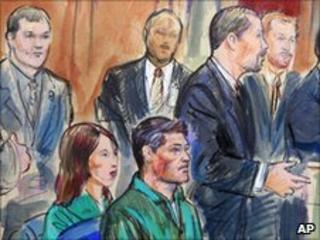 Natalia Pereverzeva (L) and Mikhail Kutzik (both in green) in court in Virginia, 2 July