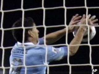 Luis Suarez handling the ball