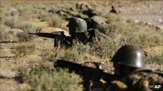 Afghan National Army soldiers participate in exercises with Nato forces outside Herat, Afghanistan