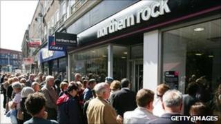 Customers of Northern Rock queue outside the Kingston branch