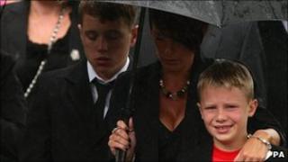 Ethan Horton, 9, follows the coffin of his father Colour Sergeant Martyn Horton