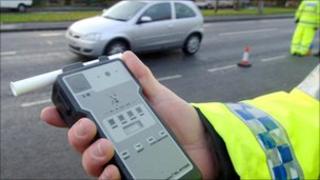 Officer holds breath test kit