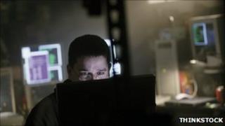 man behind computer