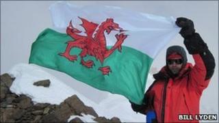 Expedition team member at the summit of Noshaq (photo: Bill Lyden)