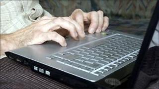 Writing at laptop