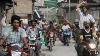 Protesters in Indian-administered Kashmir