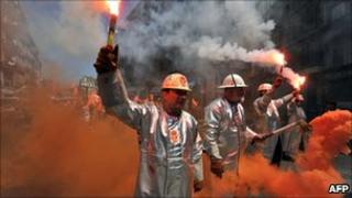 Iron and steel workers demonstrate in Marseille during a nationwide strike called by unions against the pension overhaul: June 24, 2010