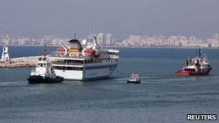 The Mavi Marmara is towed out of Haifa, 5 August