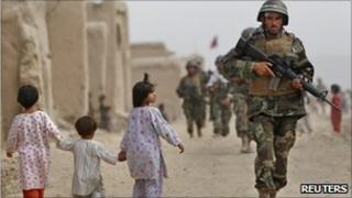 Afghan soldiers in Bazaar e Panjwaii village, Kandahar province, 10 August