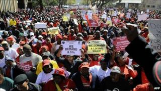Thousands of South African civil servants march through Pretoria on 10 August 10 2010 on a one-day strike to press for better salaries