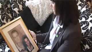 Angela Smith with a photograph of her son Kyle
