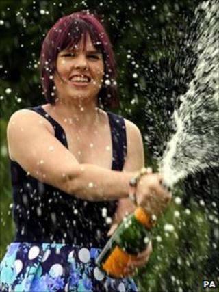 Stacey Bywater celebrates her win with champagne