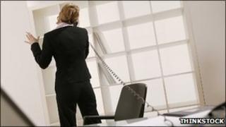 Businesswoman talking on telephone in office (Photo: Thinkstock)