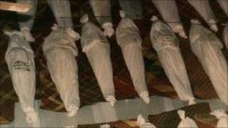 Bodies of Muslims killed in 1990