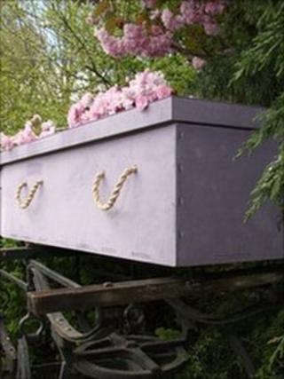 Newspaper coffin