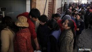 People queue in Potosi on 10 August 2010