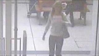 Sylwia Ciapcinska entering a store in Coopers Square shopping complex.
