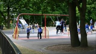 children playing on swings