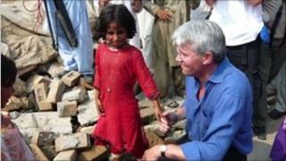 Andrew Mitchell with a girl