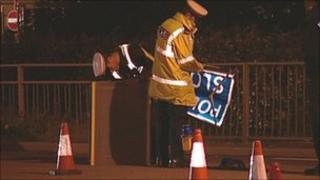 Police setting out cones