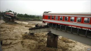 Train cars on the bridge on Sichuan province on 19 August 2010