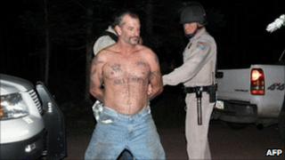 John McCluskey is taken into custody in Arizona