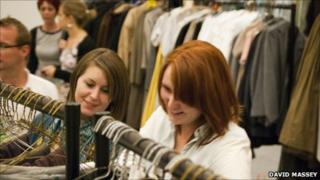 Looking through the racks of costumes