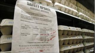 A recall warning to customers on a piece of paper at a market