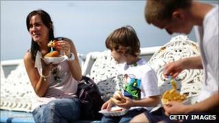 Family eating fish and chips in Blackpool