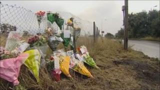 Flowers left at the scene of the crash