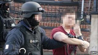 Arrest during armed raid in Wigan