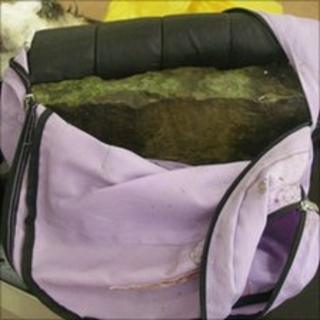 Rucksack containing bricks