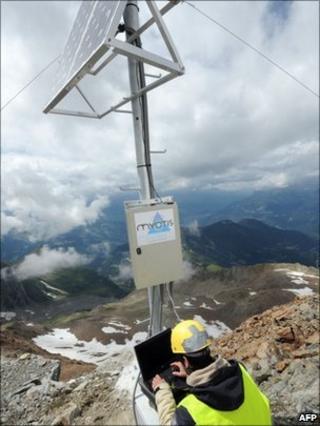 File photograph of a technician on the Tete Rousse glacier on Mont Blanc, France