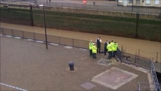Officers at the dockside