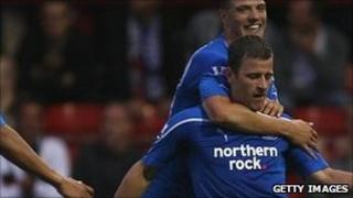 Ryan Taylor (right) opened the scoring for Newcastle