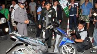 Police check scene of bomb, Bangkok, 28 August 2010