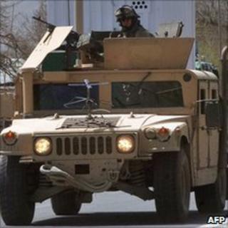 US soldiers riding in an armoured car in Afghanistan