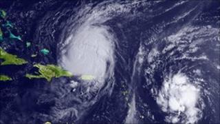 Satellite image of hurricane Earl (l) and Tropical Storm Fiona on 31 August 2010