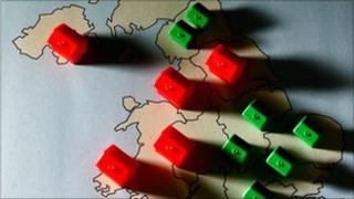 Monopoly pieces on map