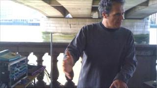 Nick Franglen playing his theremin under London Bridge