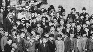 Children waiting outside the SS Asturias
