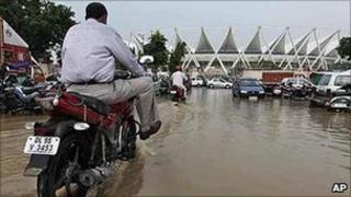 Flooding outside the Jawaharlal Nehru stadium, one of the main Commonwealth Games venues