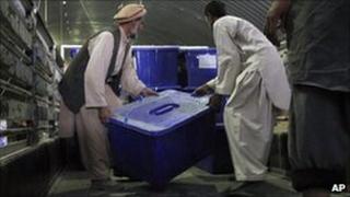 Afghan election workers in Kabul load ballot materials on a lorry to be transported to polling stations. Photo: 14 September 2010