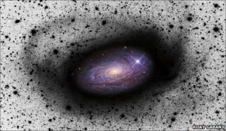 Spiral galaxy eating a dwarf galaxy - D MartÃnez-Delgado (MPIA)