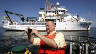 Adm Thad Allen onboard a ship alongside the NOAA research vessel Pisces, involved in the oil spill response efforts near the coast of Louisiana on 14 Sept 2010