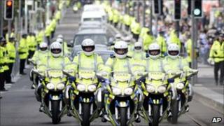 Police outriders escorting the Pope mobile