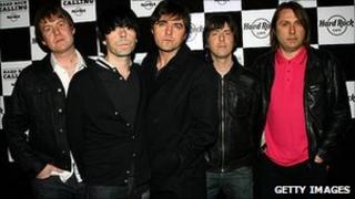 The Charlatans, with Jon Brookes far right