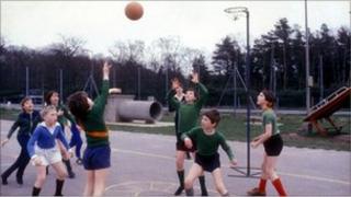 1980s school children playing netball