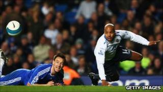 Marlon King (right) in action for Wigan against Chelsea