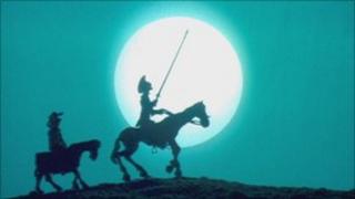 Image of Don Quixote and his squire Sancho Panza travelling on horseback